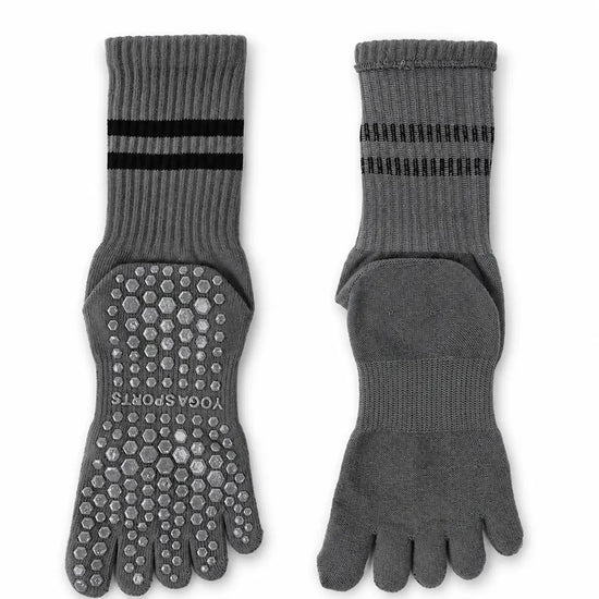 Calcetines para dedos del pie con puntos de silicona color gris Sowilo, accesorio largo y elástico ideal para uso diario con calzado respetuoso.