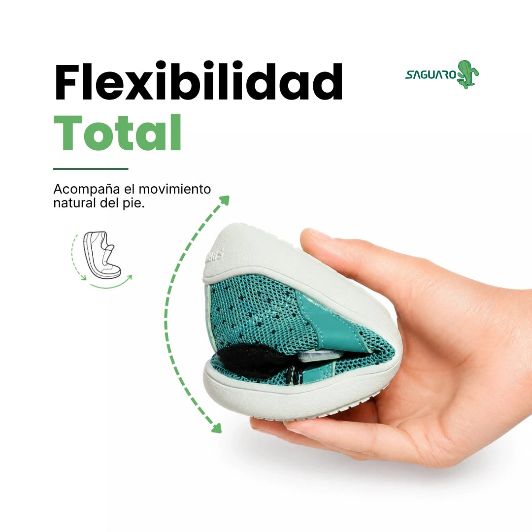 Calzado barefoot para niños Saguaro Kids Luck verde, zapatilla minimalista ligera y transpirable de horma ancha para el libre movimiento del pie.