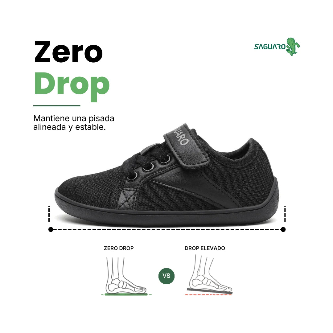 Perfil calzado ergonómico negro infantil, cierre de velcro y zero drop