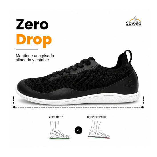 Vista lateral zapatilla negra deportiva zero drop indoor.