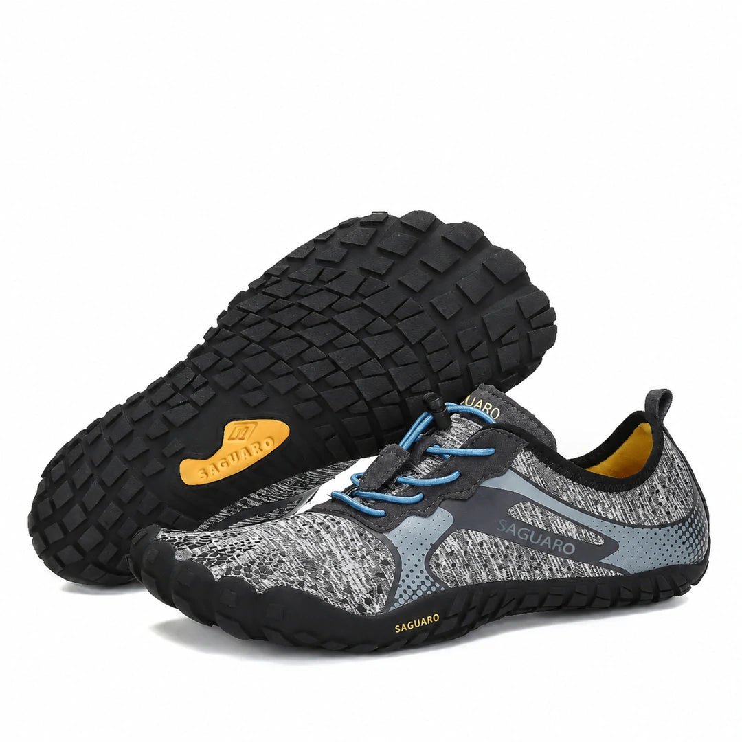 Zapatillas Saguaro Fast I gris mostrando suela y lateral en combinación.