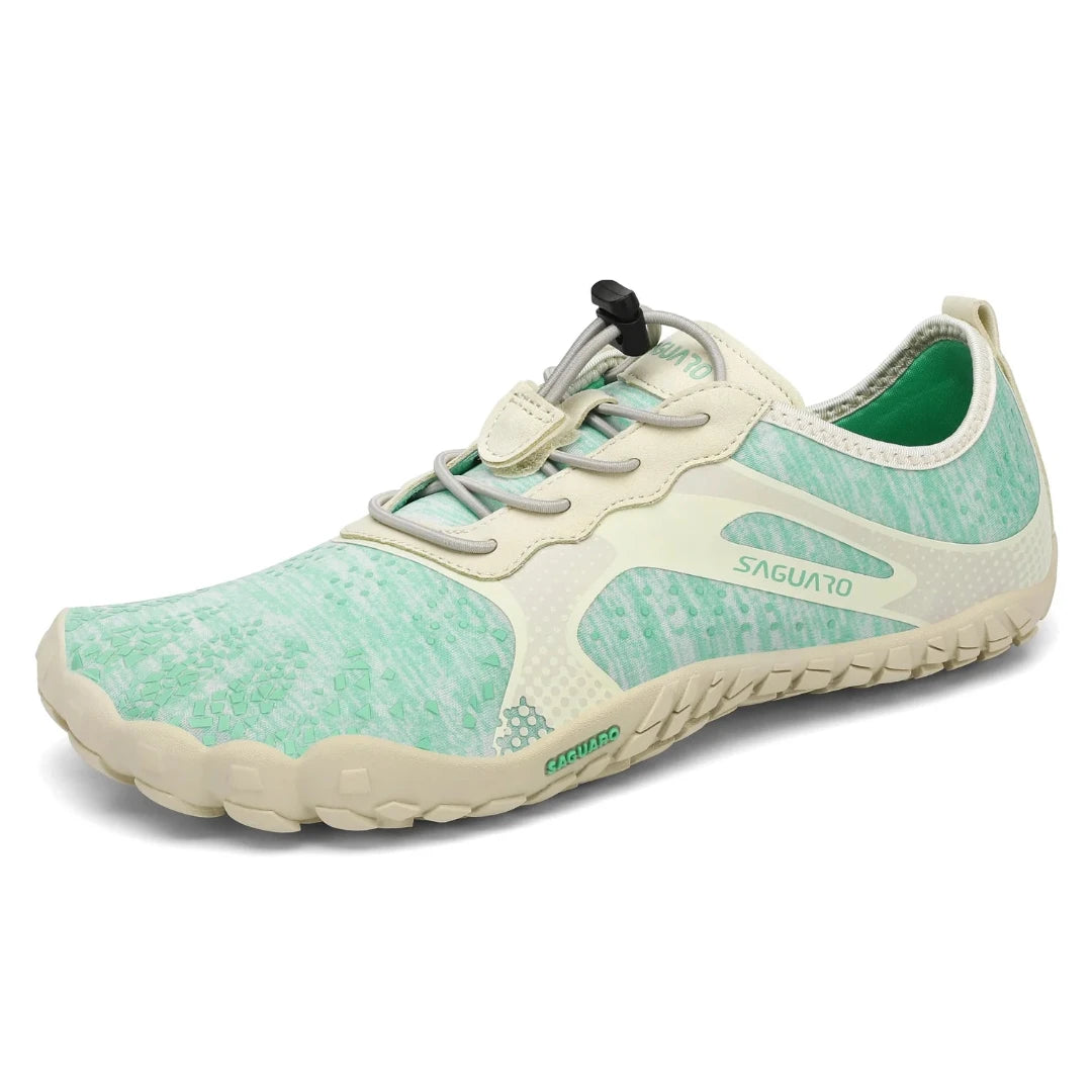 Zapatilla Saguaro Fast I turquesa vista diagonal mostrando diseño deportivo minimalista.