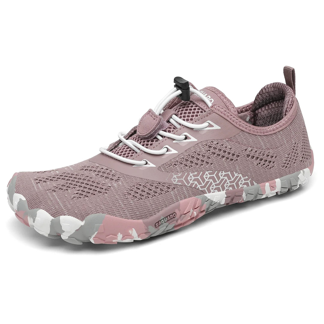 Zapatilla Smart II rosa coral vista lateral destacando estructura flexible ergonómica.