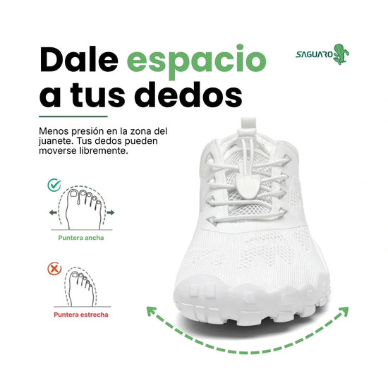 Zapatillas blancas vista frontal con puntera ancha barefoot.
