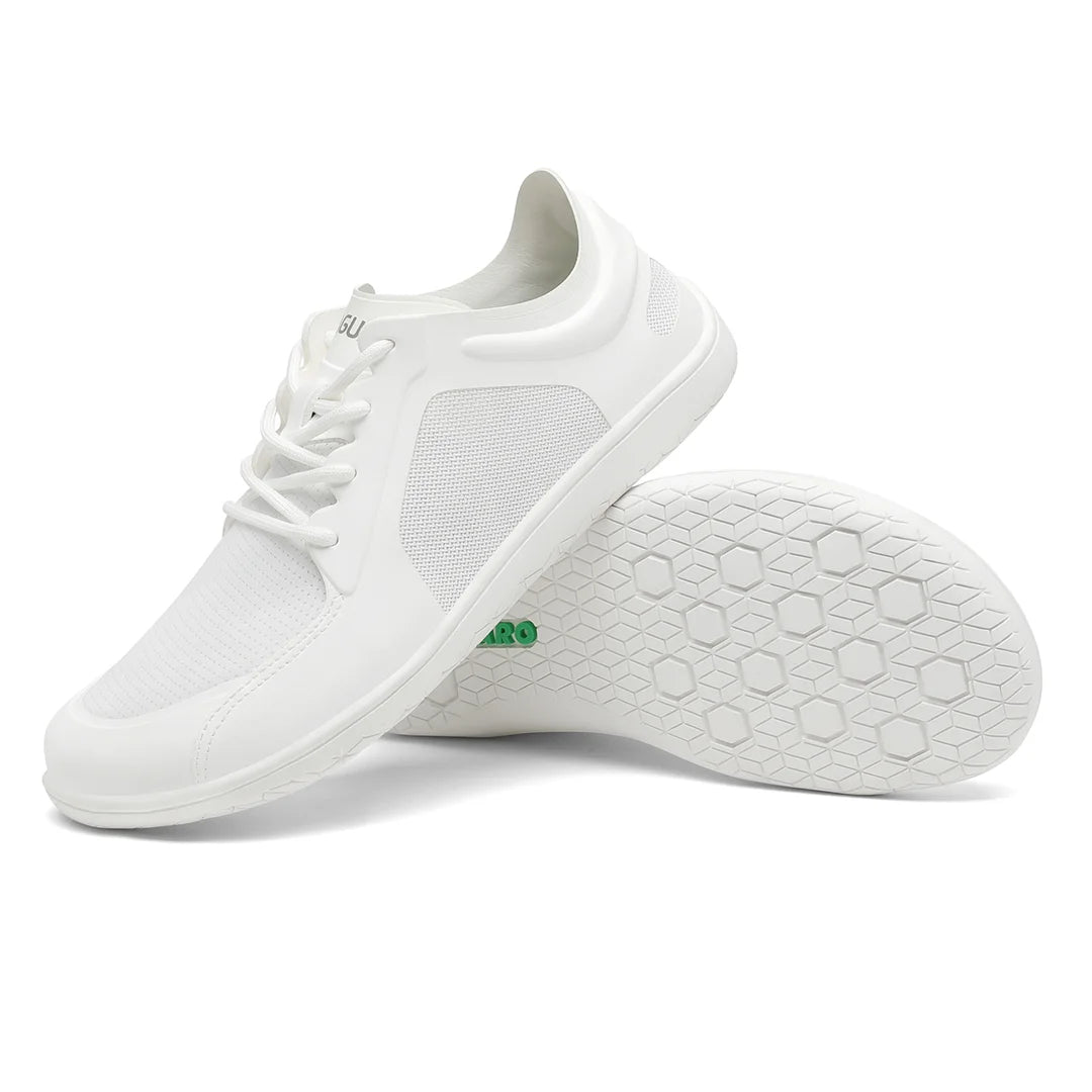Suela flexible y totalmente plana (zero drop) de zapatillas Saguaro Wish II blancas, diseñada para una pisada natural.